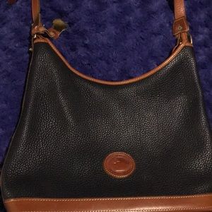 A barely used Dooney & Bourke purse.
